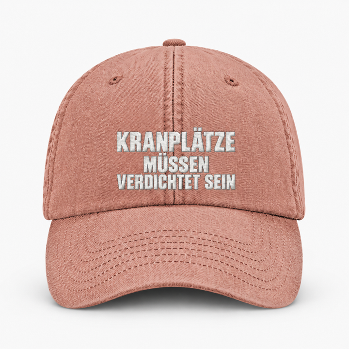 KRANPLÄTZE MÜSSEN VERDICHTET SEIN Vintage Cap in Vintage Orange mit hellem Stick – Frontansicht
